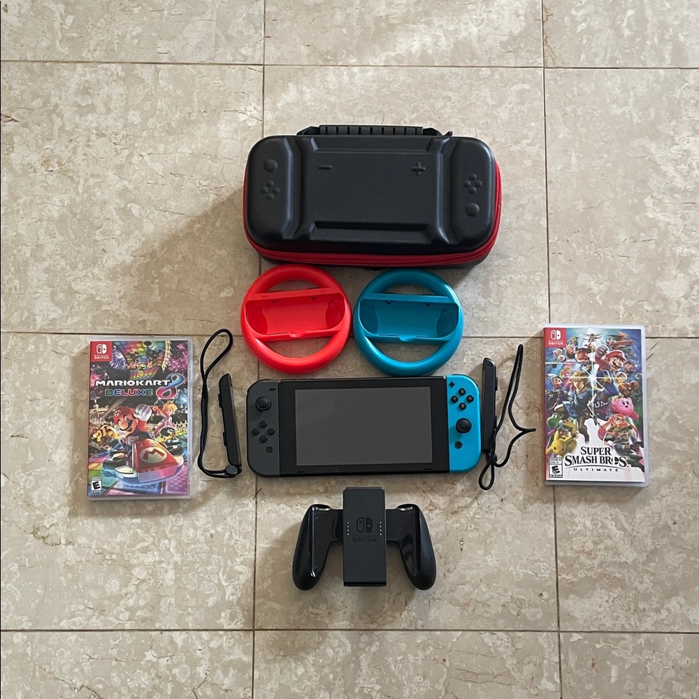 Nintendo Switch with Blue and Red Joy-Cons and Games